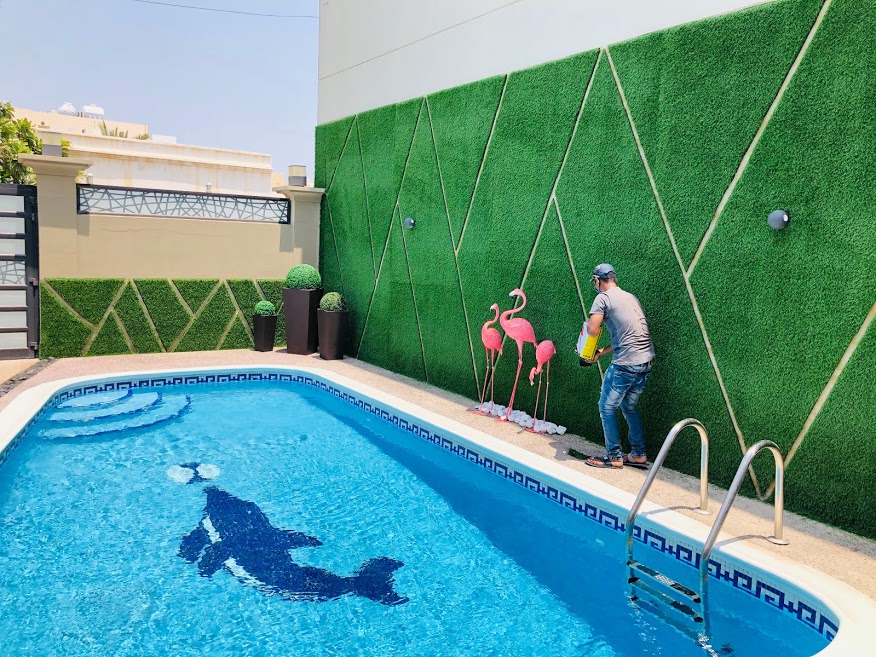 <blockquote><h3>Best Artificial Grass for Swimming Pool Area in Bahrain</h3>Best Artificial Grass for Swimming Pool Area in Bahrain

Welcome to Green Grass Bahrain

Transform your poolside into a haven of enjoyment with Green Grass Store's versatile and safe artificial turf solutions.
Our customizable, non-toxic turf is an excellent choice for both residential and commercial pool areas and on ground above pools.
The composition of synthetic grass, coupled with meticulous installation techniques, ensures superior shock absorption, providing a comfortable surface for relaxation by the pool.
Moreover, our synthetic grass mirrors the appearance of natural grass, creating a lifelike and inviting atmosphere around your pool.
If you are seeking a low-maintenance, pool-friendly landscaping solution, put your trust in Green Grass Bahrain
Our high-quality products and skilled installers are here to turn your pool area into a hassle-free, visually appealing space for relaxation and enjoyment.</blockquote>